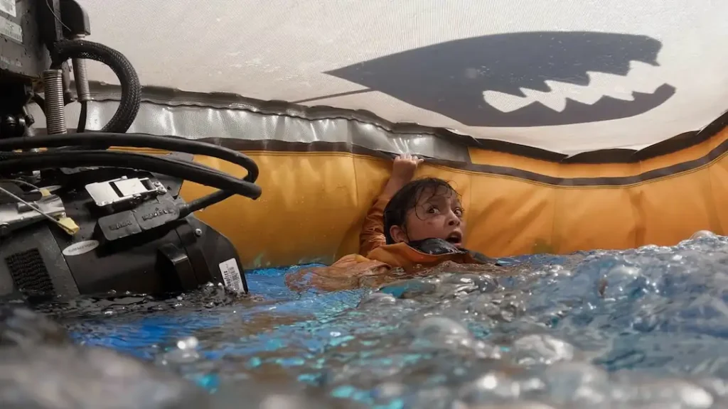Trouble in the water as a T Rex hunts a family