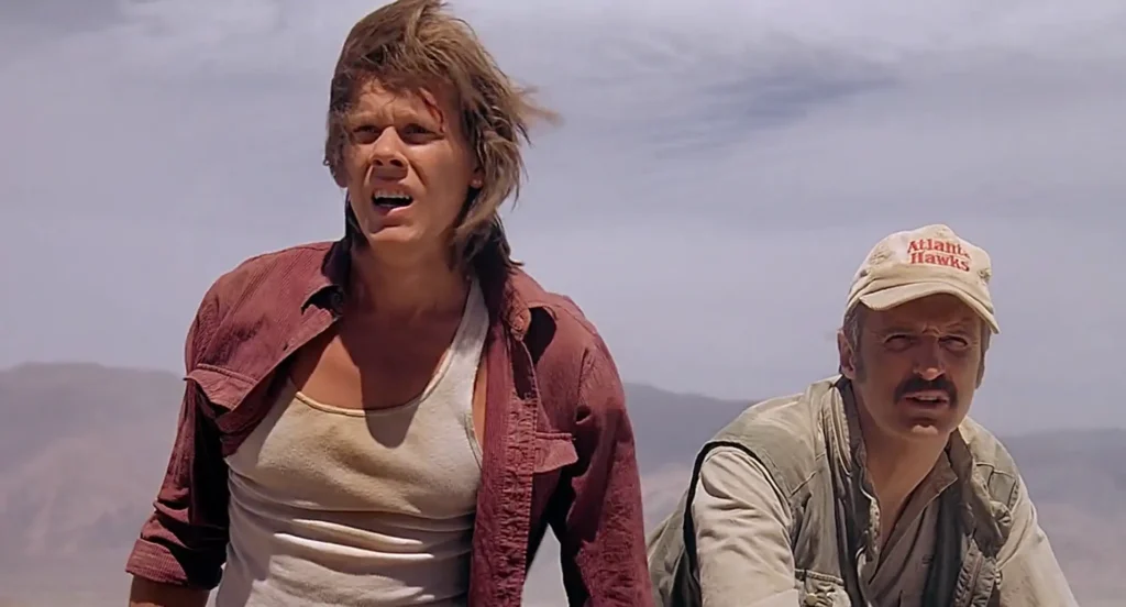 Kevin Bacon and Michael Gross in Tremors 1990